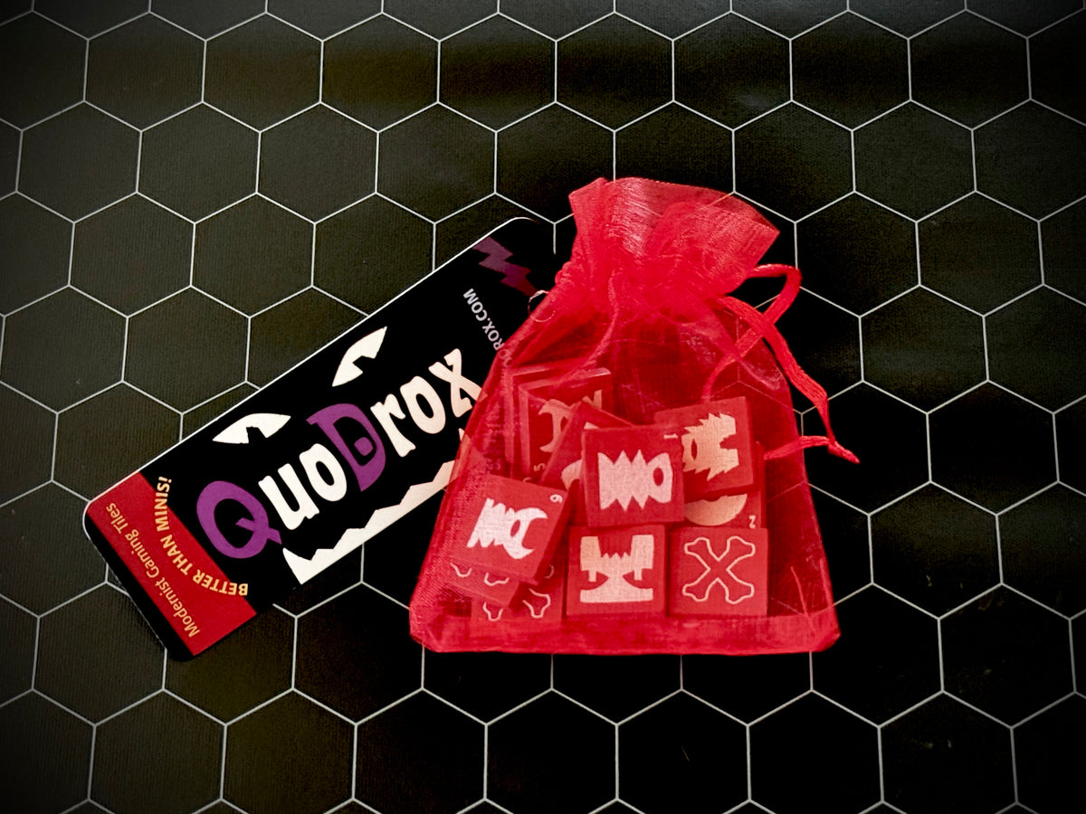 Bag of ochre red QuoDrox tiles. 