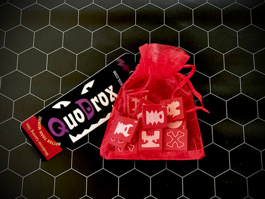Bag of ochre red QuoDrox tiles. 