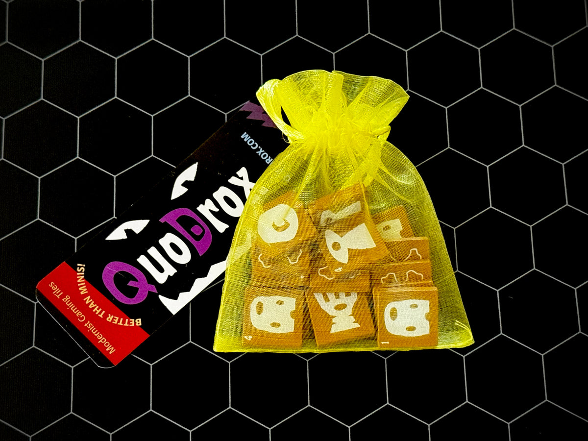 Bag of yellow QuoDrox tiles. 